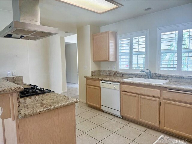 8520 Bolero Dr, Yucca Valley, CA 92284 - kitchen featuring wall chimney exhaust hood, white dishwasher, light brown cabinets, a sink, and light tile patterned floors