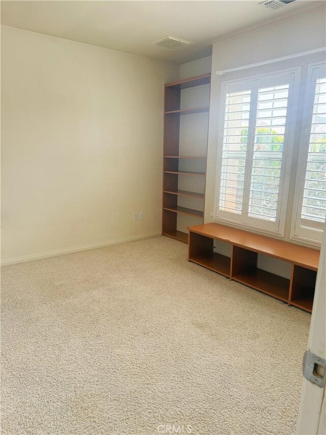 8520 Bolero Dr, Yucca Valley, CA 92284 - unfurnished bedroom featuring carpet flooring and baseboards