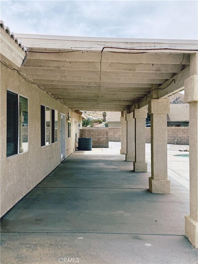 8520 Bolero Dr, Yucca Valley, CA 92284 - view of patio featuring central AC