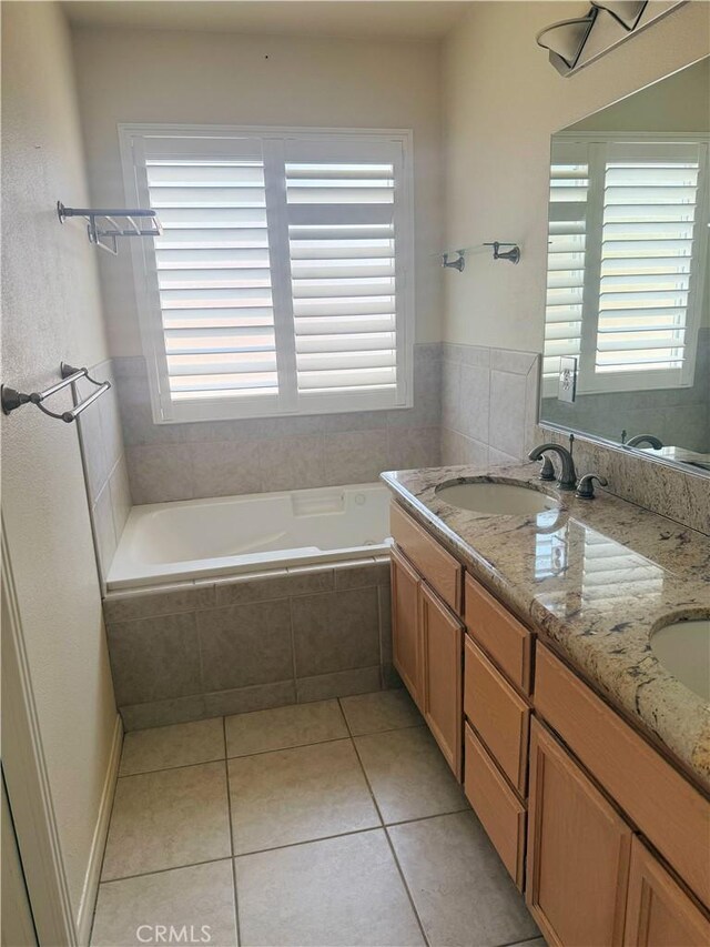8520 Bolero Dr, Yucca Valley, CA 92284 - full bathroom featuring tiled tub, tile patterned flooring, and double vanity