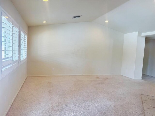 8520 Bolero Dr, Yucca Valley, CA 92284 - carpeted empty room featuring baseboards and recessed lighting