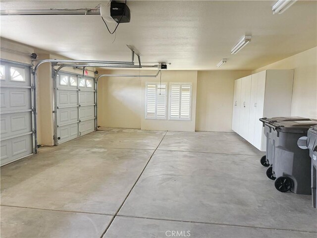 8520 Bolero Dr, Yucca Valley, CA 92284 - garage featuring a garage door opener