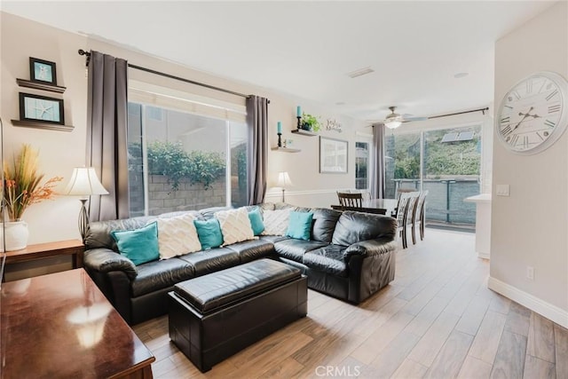 20019 Franks Way, Saugus, CA 91350 - living area featuring light wood finished floors, baseboards, and ceiling fan