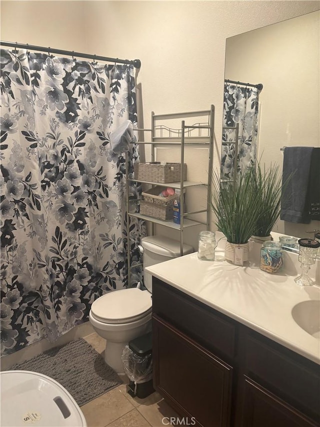 1884 Glow Pointe, San Jacinto, CA 92582 - full bath featuring vanity, toilet, tile patterned flooring, and a shower with shower curtain