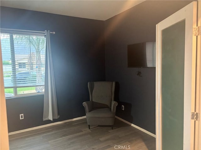 1884 Glow Pointe, San Jacinto, CA 92582 - living area featuring wood finished floors and baseboards