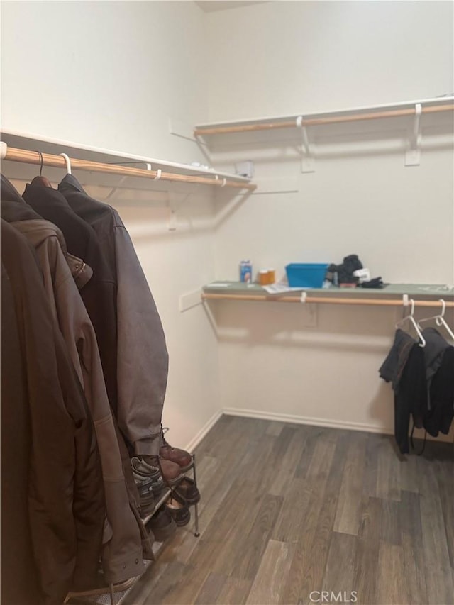 1884 Glow Pointe, San Jacinto, CA 92582 - spacious closet featuring wood finished floors