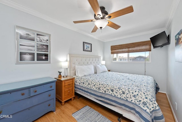 4975 Sandyland Rd Unit 302, Carpinteria, CA 93013 - bedroom with light wood-style floors, crown molding, and ceiling fan