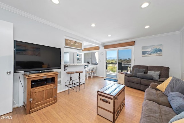 4975 Sandyland Rd Unit 302, Carpinteria, CA 93013 - living area with ornamental molding, recessed lighting, and light wood-style flooring