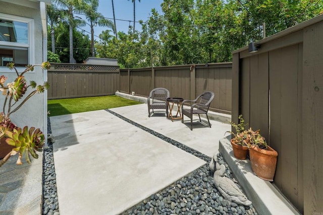 6848 Xana Way, Carlsbad, CA 92009 - fenced backyard with a patio area