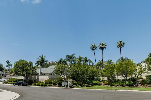 6848 Xana Way, Carlsbad, CA 92009 - view of asphalt street with curbs and a residential view