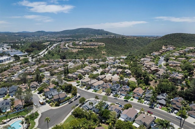 6848 Xana Way, Carlsbad, CA 92009 - aerial overview of property's location featuring a mountainous background and nearby suburban area