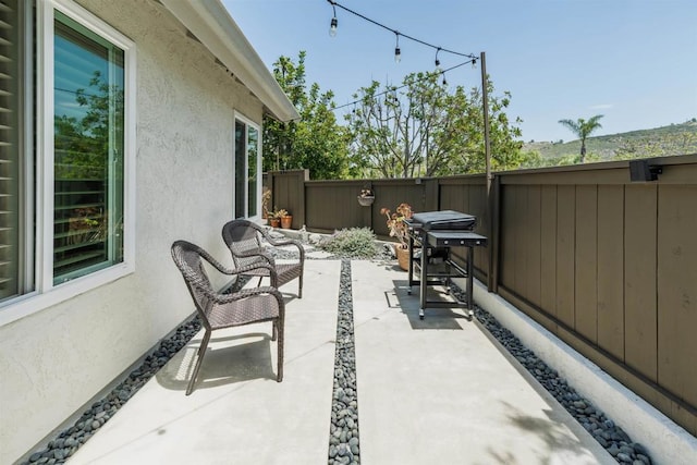 6848 Xana Way, Carlsbad, CA 92009 - fenced backyard featuring a patio area and a grill