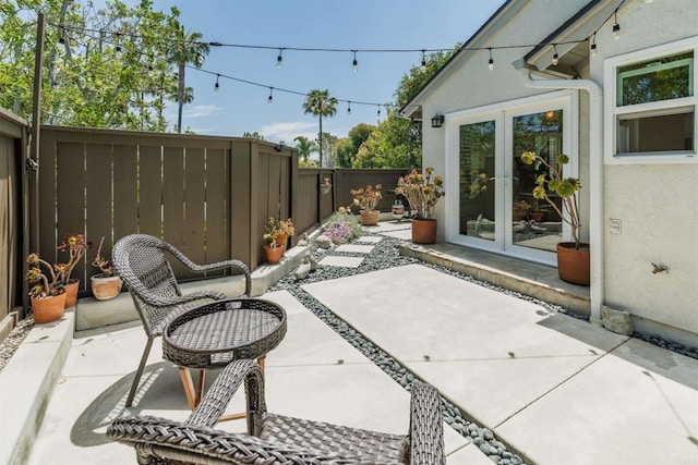 6848 Xana Way, Carlsbad, CA 92009 - fenced backyard featuring french doors and a patio