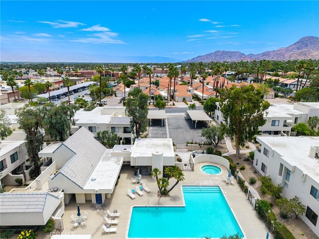 45405 Lupine Ln Unit 16, Palm Desert, CA 92260 - aerial view of residential area featuring a pool area and mountains