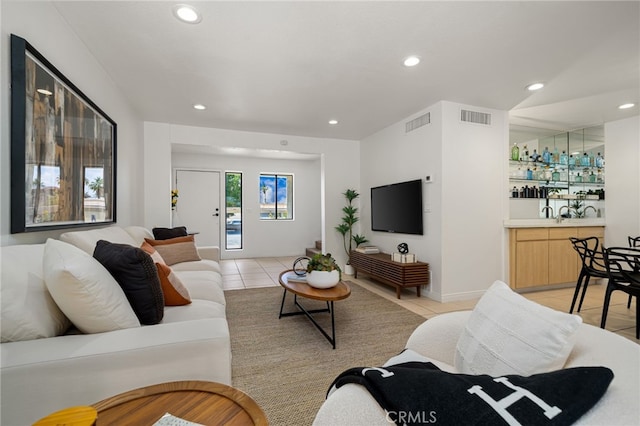 45405 Lupine Ln Unit 16, Palm Desert, CA 92260 - living area featuring light tile patterned floors, recessed lighting, and bar area