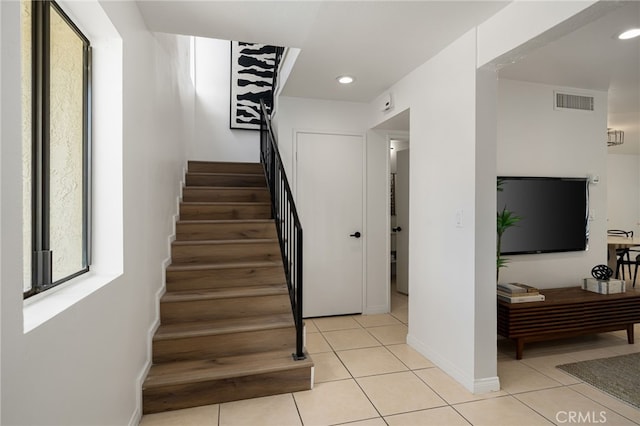 45405 Lupine Ln Unit 16, Palm Desert, CA 92260 - staircase featuring tile patterned flooring, baseboards, and recessed lighting