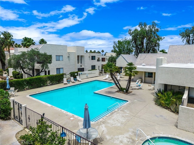 45405 Lupine Ln Unit 16, Palm Desert, CA 92260 - community pool featuring a patio area and a residential view