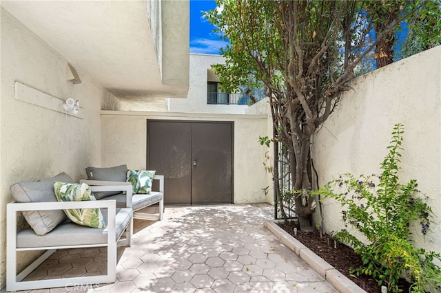 45405 Lupine Ln Unit 16, Palm Desert, CA 92260 - property entrance featuring stucco siding and a patio area