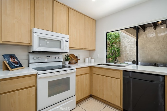 45405 Lupine Ln Unit 16, Palm Desert, CA 92260 - kitchen featuring white appliances, light brown cabinets, and a sink