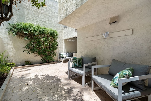45405 Lupine Ln Unit 16, Palm Desert, CA 92260 - view of patio featuring an outdoor living space
