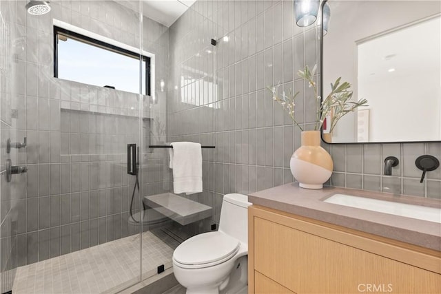 13536 Morrison St, Sherman Oaks, CA 91423 - full bath with tile walls, vanity, toilet, and a stall shower