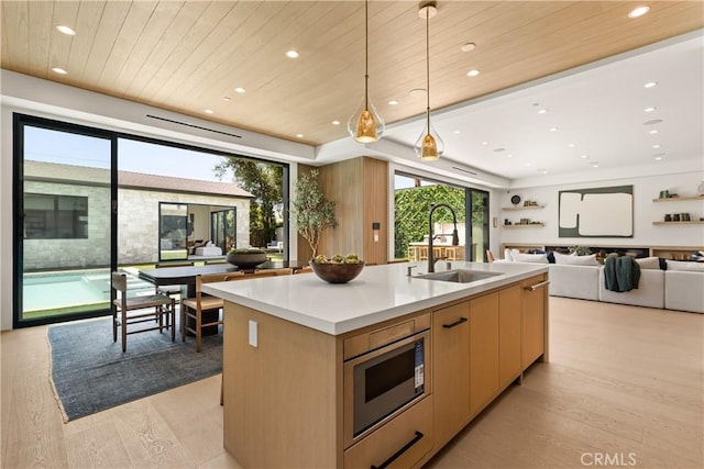 13536 Morrison St, Sherman Oaks, CA 91423 - kitchen with stainless steel microwave, a sink, wooden ceiling, hanging light fixtures, and recessed lighting
