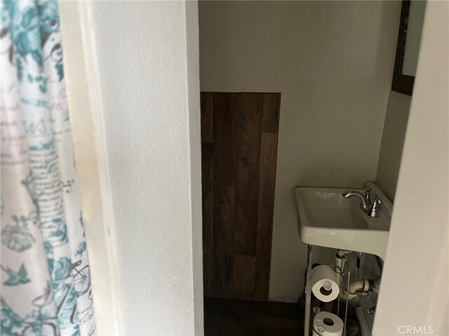 2730 Walnut St, Huntington Park, CA 90255 - bathroom with a sink and a shower with curtain