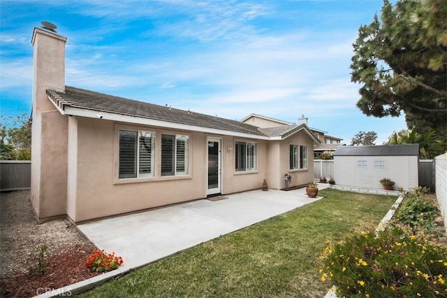 1171 Otano Way, Oxnard, CA 93030 - back of house featuring a chimney, stucco siding, and a patio