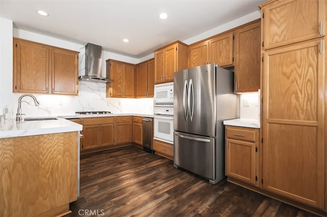 1171 Otano Way, Oxnard, CA 93030 - kitchen with wall chimney exhaust hood, white appliances, a sink, dark wood-type flooring, and recessed lighting