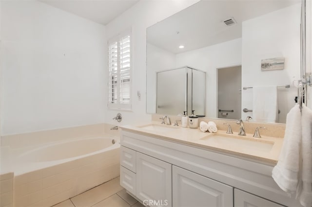 1171 Otano Way, Oxnard, CA 93030 - full bath featuring double vanity, a garden tub, and tile patterned floors