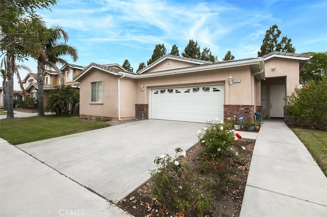 1171 Otano Way, Oxnard, CA 93030 - ranch-style home featuring stucco siding, a garage, concrete driveway, and a front yard