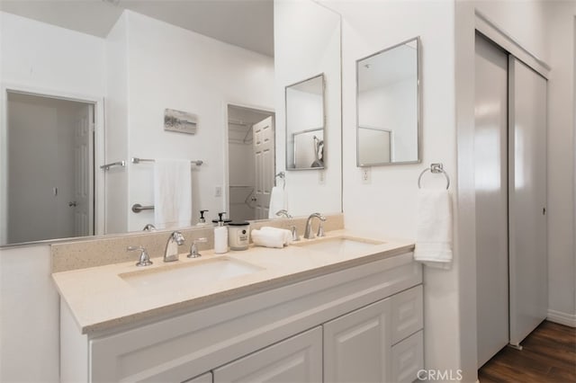 1171 Otano Way, Oxnard, CA 93030 - bathroom featuring double vanity and wood finished floors