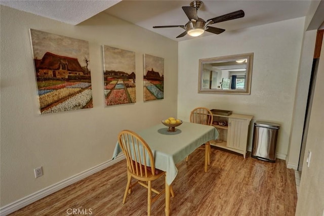 25712 Le Parc Unit 7, Lake Forest, CA 92630 - dining room featuring wood finished floors, ceiling fan, and baseboards