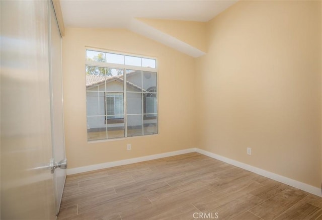 369 Chaumont Cir, Lake Forest, CA 92610 - empty room with wood finished floors and lofted ceiling