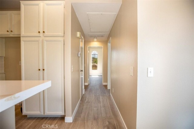 369 Chaumont Cir, Lake Forest, CA 92610 - hallway featuring attic access and light wood finished floors