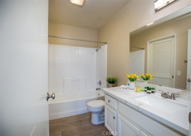 369 Chaumont Cir, Lake Forest, CA 92610 - bathroom featuring vanity, shower / bathtub combination, wood finished floors, and a textured ceiling