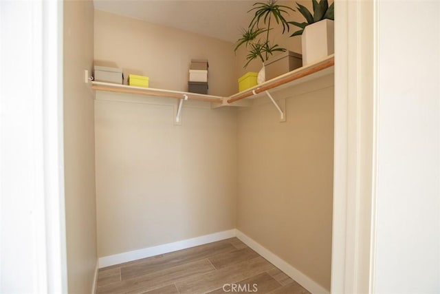 369 Chaumont Cir, Lake Forest, CA 92610 - spacious closet featuring wood finished floors