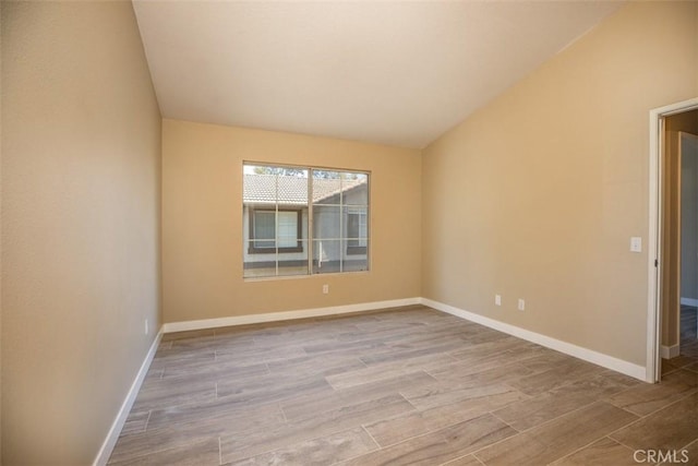 369 Chaumont Cir, Lake Forest, CA 92610 - unfurnished room featuring lofted ceiling and wood finished floors