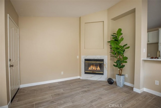 369 Chaumont Cir, Lake Forest, CA 92610 - unfurnished living room with wood tiled floors and a premium fireplace