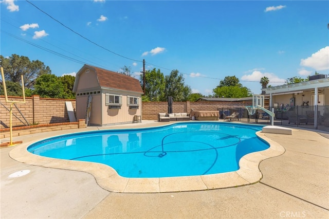 3546 Kenmill St, Riverside, CA 92504 - view of swimming pool with a fenced backyard and a patio area