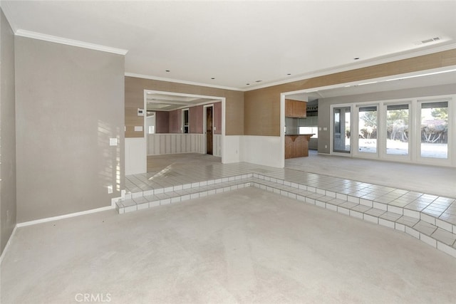 19355 Tomahawk Rd, Apple Valley, CA 92307 - unfurnished room featuring ornamental molding, carpet flooring, tile patterned floors, and a wainscoted wall