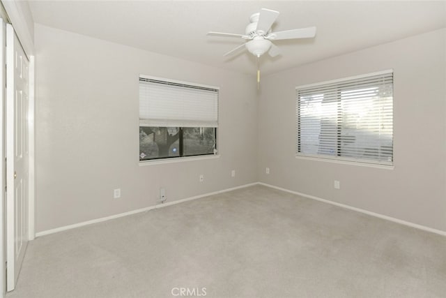 19355 Tomahawk Rd, Apple Valley, CA 92307 - unfurnished room with carpet flooring, baseboards, and ceiling fan