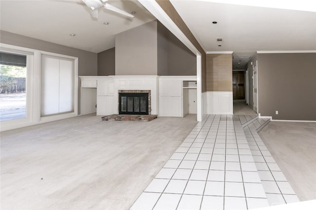 19355 Tomahawk Rd, Apple Valley, CA 92307 - unfurnished living room with light colored carpet, a ceiling fan, a brick fireplace, and ornamental molding