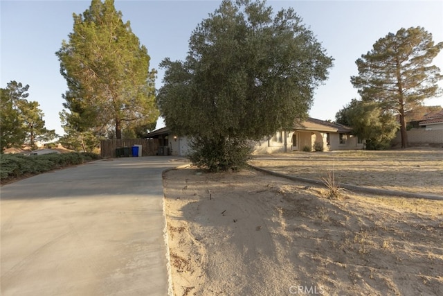 19355 Tomahawk Rd, Apple Valley, CA 92307 - obstructed view of property with concrete driveway and a garage