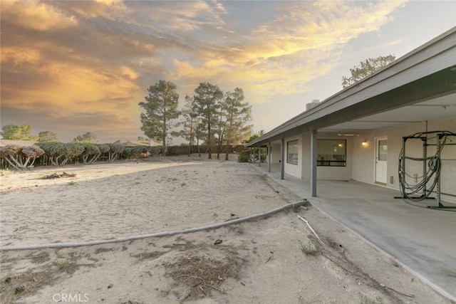 19355 Tomahawk Rd, Apple Valley, CA 92307 - yard at dusk with a patio
