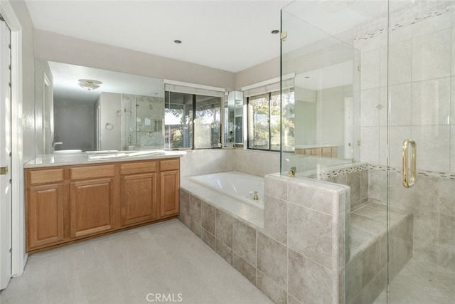 19355 Tomahawk Rd, Apple Valley, CA 92307 - full bathroom featuring a garden tub, vanity, and a shower stall
