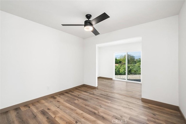 1563 Gary Ln, Redlands, CA 92374 - unfurnished room with wood finished floors, baseboards, and a ceiling fan