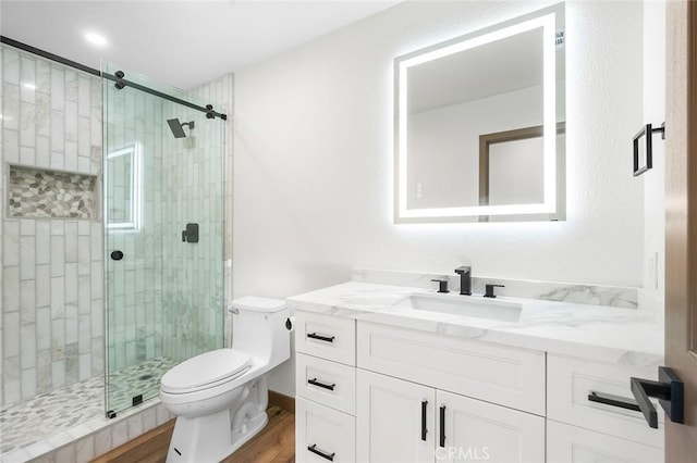 1563 Gary Ln, Redlands, CA 92374 - full bathroom with toilet, vanity, wood finished floors, and a shower stall