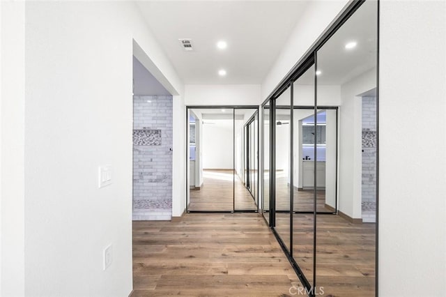 1563 Gary Ln, Redlands, CA 92374 - hallway featuring wood finished floors, baseboards, and recessed lighting