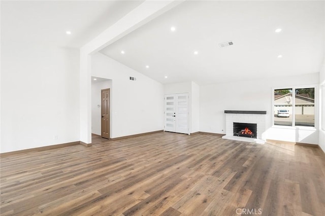 1563 Gary Ln, Redlands, CA 92374 - unfurnished living room featuring a fireplace, wood finished floors, recessed lighting, baseboards, and beamed ceiling